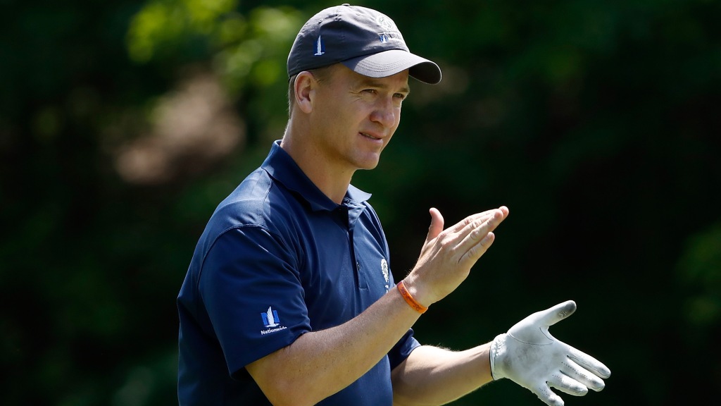 Peyton Manning sports his customized golf cart at Sweetens Cove