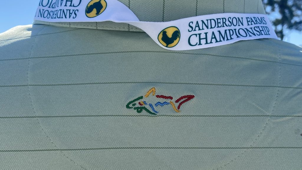 Greg Norman’s logo on volunteer shirts at PGA event