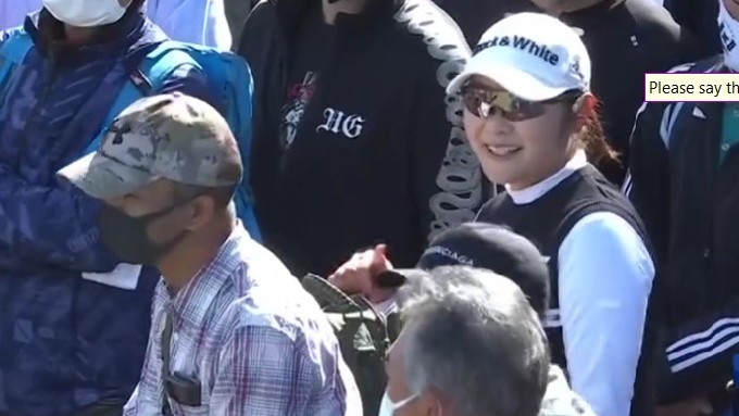 Watch: LPGA Pro's Ball Lands In Fan's Backpack