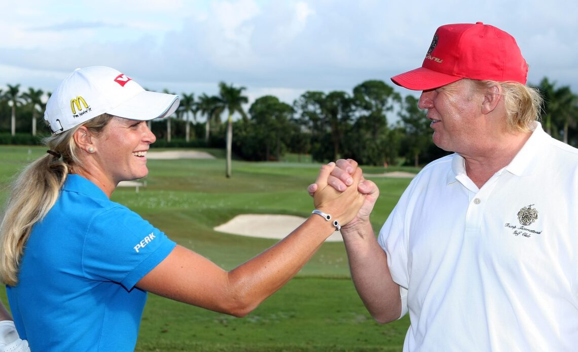 WEST PALM BEACH, FL - NOVEMBER 14: LPGA player Suzann Pettersen of Norway is greeted by Donald Trump prior to the start of the ADT Championship at the Trump International Golf Club on November 14, 2007 in West Palm Beach, Florida (Photo by Scott Halleran/Getty Images)