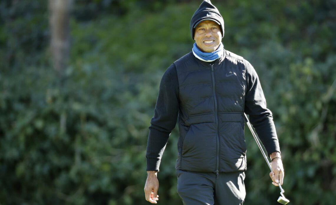 PGA Tour pro Aaron Rai follows Tiger Woods at Genesis pro-am