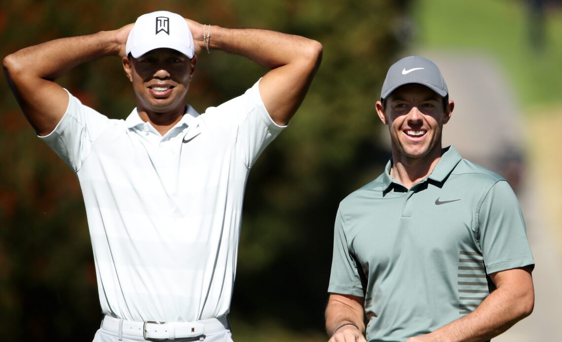 PACIFIC PALISADES, CA - FEBRUARY 16: Tiger Woods and Rory McIlroy of Northern Ireland meet at the fourth tee during the second round of the Genesis Open at Riviera Country Club on February 16, 2018 in Pacific Palisades, California. (Photo by Christian Petersen/Getty Images)
