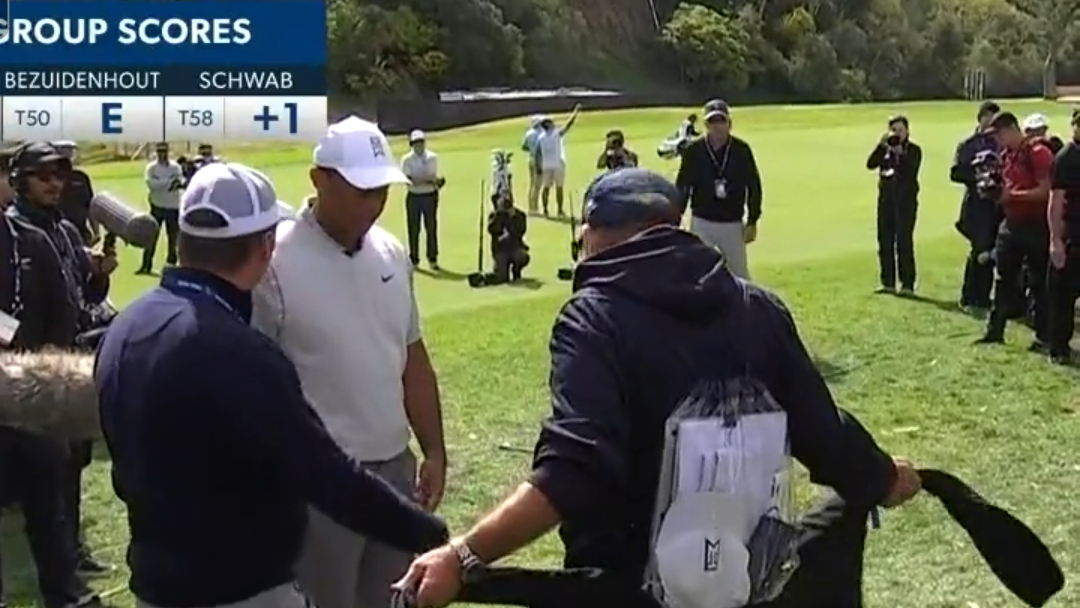WATCH: Tiger Woods Drive Lands In Fan's Jacket