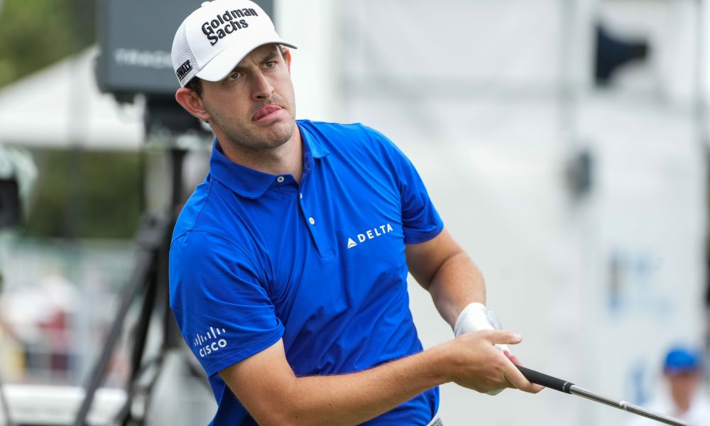 Fans time Patrick Cantlay as he plays a shot at the RBC Heritage