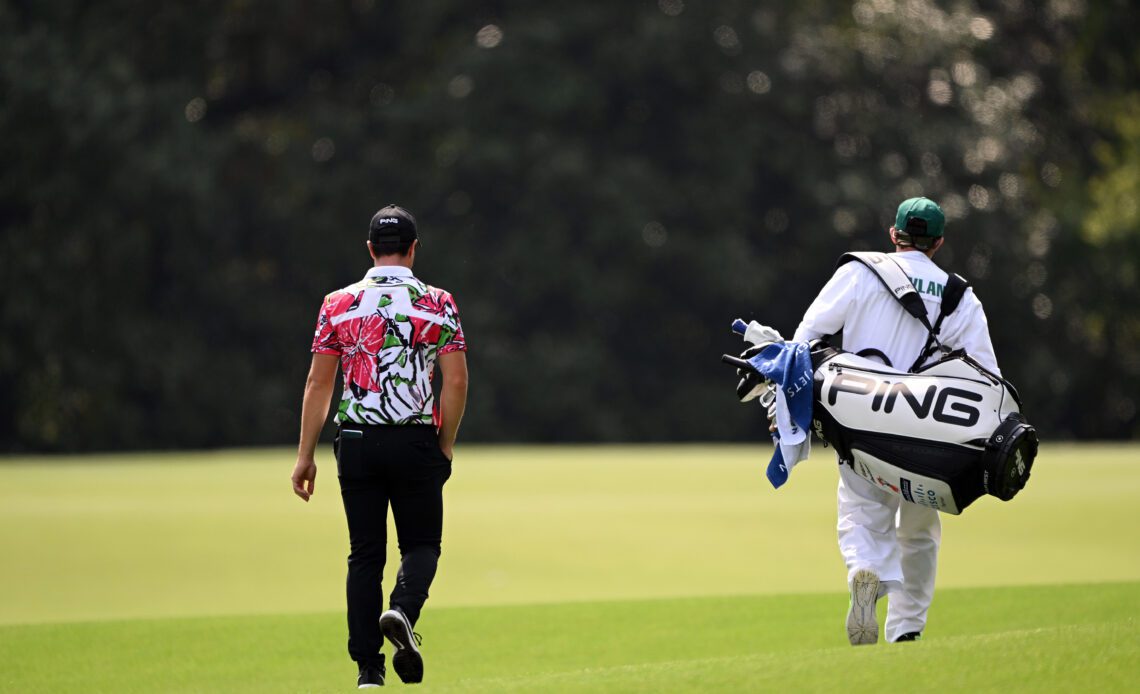 Viktor Hovland and his caddie at the 2023 Masters