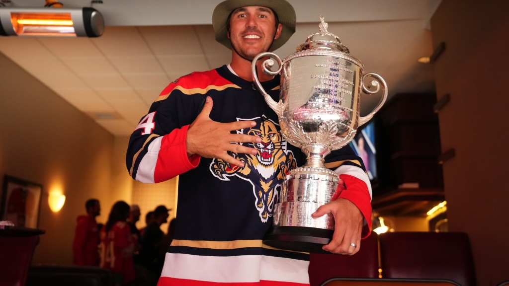 Brooks Koepka and Wanamaker trophy at Florida Panther Game 3
