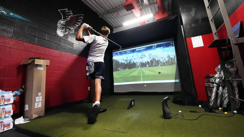 Arizona high school golf coach turns storage room into golf simulator