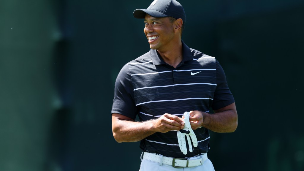Video shows Tiger Woods walking without a limp while caddying for son