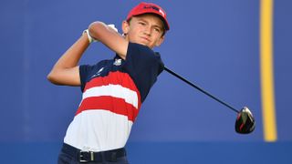 Miles Russell of team USA tees off on the 1st hole during the Day Three of the 2023 Junior Ryder Cup at Marco Simone Golf Club
