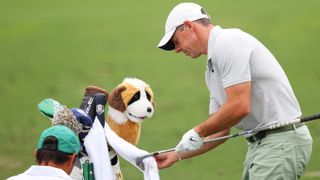 Photo of Rory McIlroy at the masters with a TaylorMade BRNR Mini driver