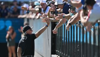 Greg Norman shakes hands with Adelaide fans