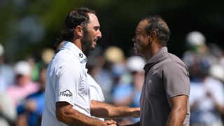 Tiger Woods and Max Homa shake hands after round two of the 2024 Masters