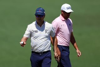 Zach Johnson waves to the crowd