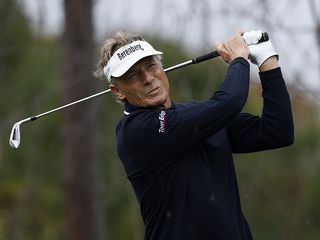 Bernhard Langer after hitting an iron shot on the golf course