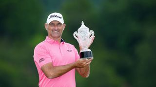 Michael Hendry poses with the For The Players By The Players 2024 trophy