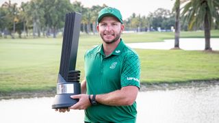 Dean Burmester with the LIV Golf Miami trophy