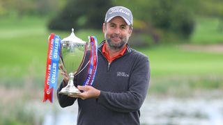 Richard Bland with the trophy after winning the 2021 Betfred British Masters