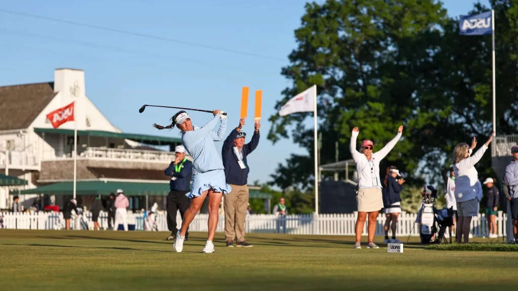 LPGA player changes diaper during wait on a tee at U.S. Women’s Open