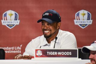 Tiger Woods smiles whilst at the 2016 Ryder Cup