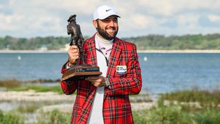 Scottie Scheffler with the RBC Heritage trophy