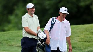 Scottie Scheffler and Ted Scott during a practice round before the Memorial Tournament