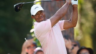 Tiger Woods takes a shot during US Open practice round