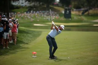 Cameron Young at the top of his backswing