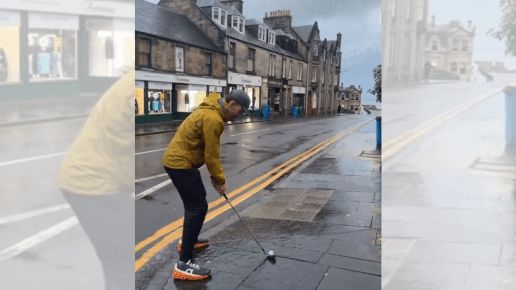 Golfer hits shot into 18th green at St. Andrews from a street over