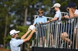 Zalatoris signs an autograph at the US Open