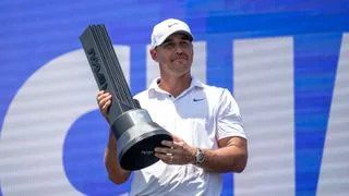 Brooks Koepka with the LIV Golf Singapore trophy