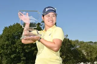 Nasa Hataoka celebrates with her trophy