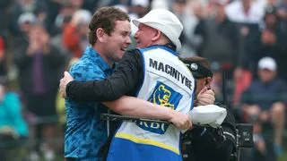 Robert MacIntyre and Dougie MacIntyre celebrate the win at the RBC Canadian Open