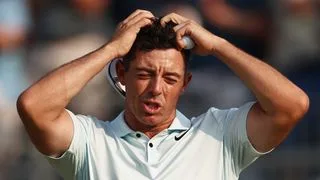 Rory McIlroy shows his frustration after missing a putt on the 18th at the US Open