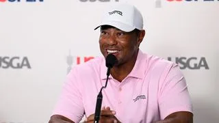 Tiger Woods talks to the media before the US Open