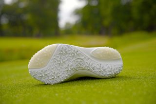 The outsole of the G/FORE G/18 golf shoe