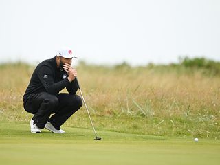 Jon Rahm reading a putt at Royal Troon for the Open Championship 2024