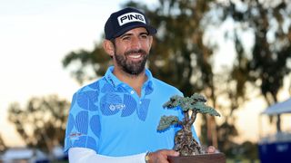Matthieu Pavon with the Farmers Insurance Open trophy