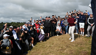Rory McIlroy hits from the fans