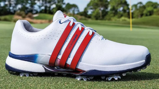 The Adidas Tour360 24' Ltd. Edition Paris SU24 Golf Shoes on a green and white background