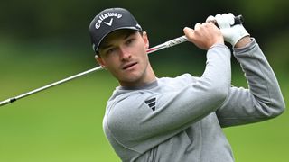 Rasmus Hojgaard takes a shot during the pro-am for the Omega European Masters