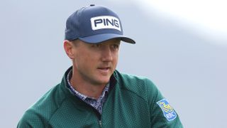 Mackenzie Hughes of Canada looks on prior to the AT&T Pebble Beach Pro-Am at Pebble Beach Golf Links