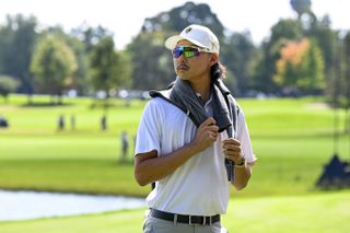 Min Woo Lee looking on as a spectator during the 2024 Presidents Cup