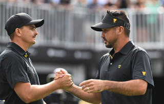 Jason Day and Christiaan Bezuidenhout shake hands