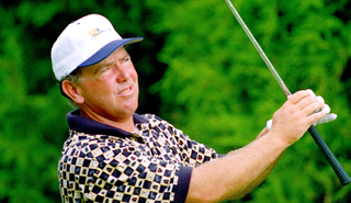 Mark O'Meara watches an iron shot at the 1996 Presidents Cup