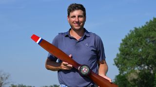 Taylor Dickson with the Blue Cross and Blue Shield of Kansas Wichita Open trophy