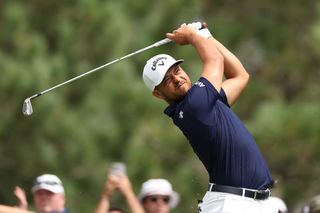 Xander Schauffele hits an iron shot