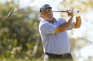 Angel Cabrera hits a tee shot with a fairway wood