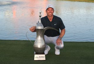 Paul Casey With The Trophy At The Dubai Desert Classic