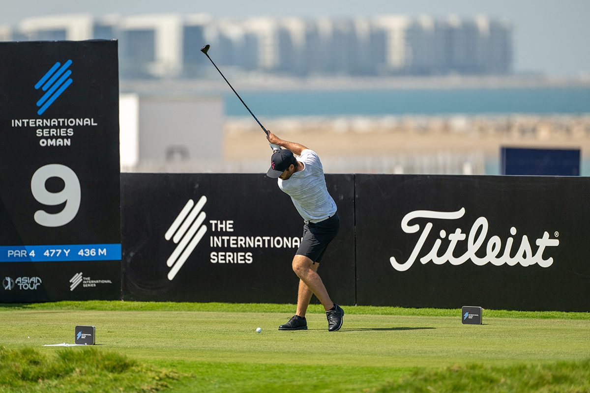 Matthew Wolff hitting a tee shot at the International Series event in Oman in 2025, demonstrating his recognisable left heel raise in the backswing to maximise rotation and generate more distance off the tee