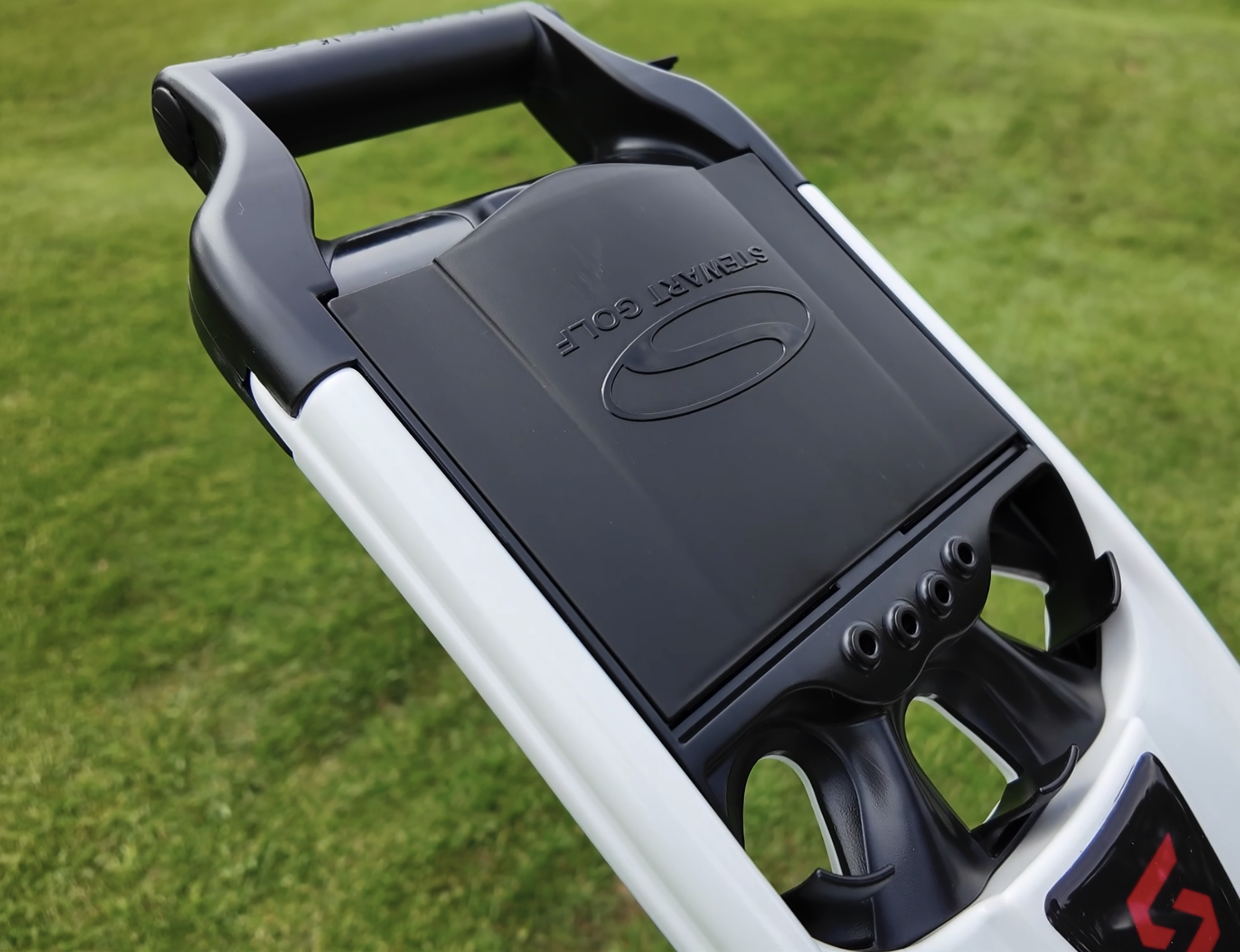 Close up on the Stewart Golf V10 Remote electric trolley handle
